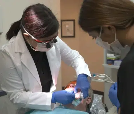Dr. Shaik providing gentle dental care to a patient
